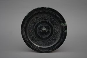    羽人神兽镜